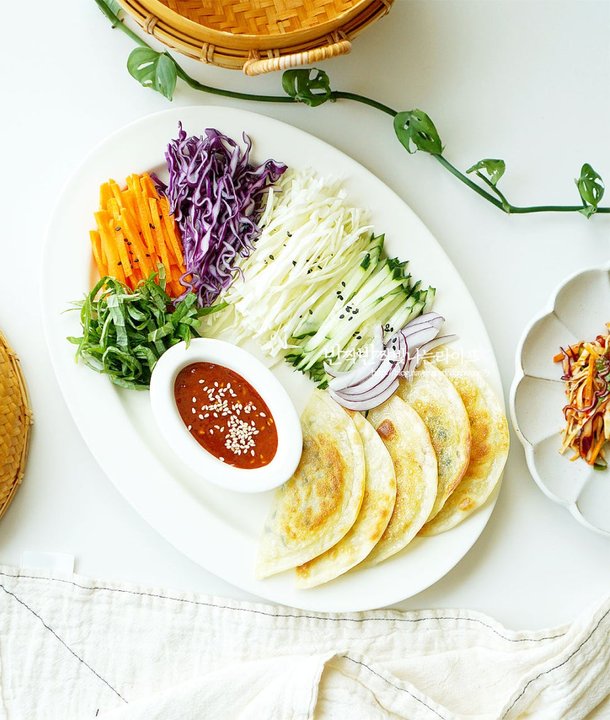 맛과 식감이 훌륭한 비빔만두 레시피 3인분 25분 완성 평점 5.0점(52) 레시피 이미지 - 1